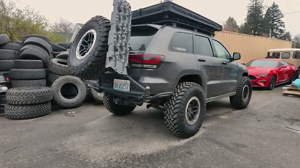 Granite Grand parked after installation of the 6 Monkeys high-clearance bumper and rear spare-tire carrier